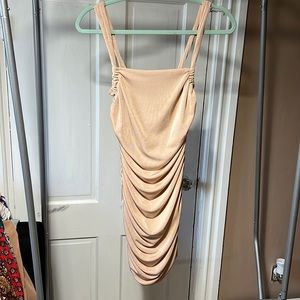 Nudie Patootie boutique nude dress. Never worn. New with tags.